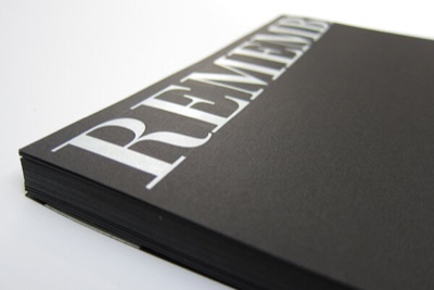Black paper white ink foil stamp