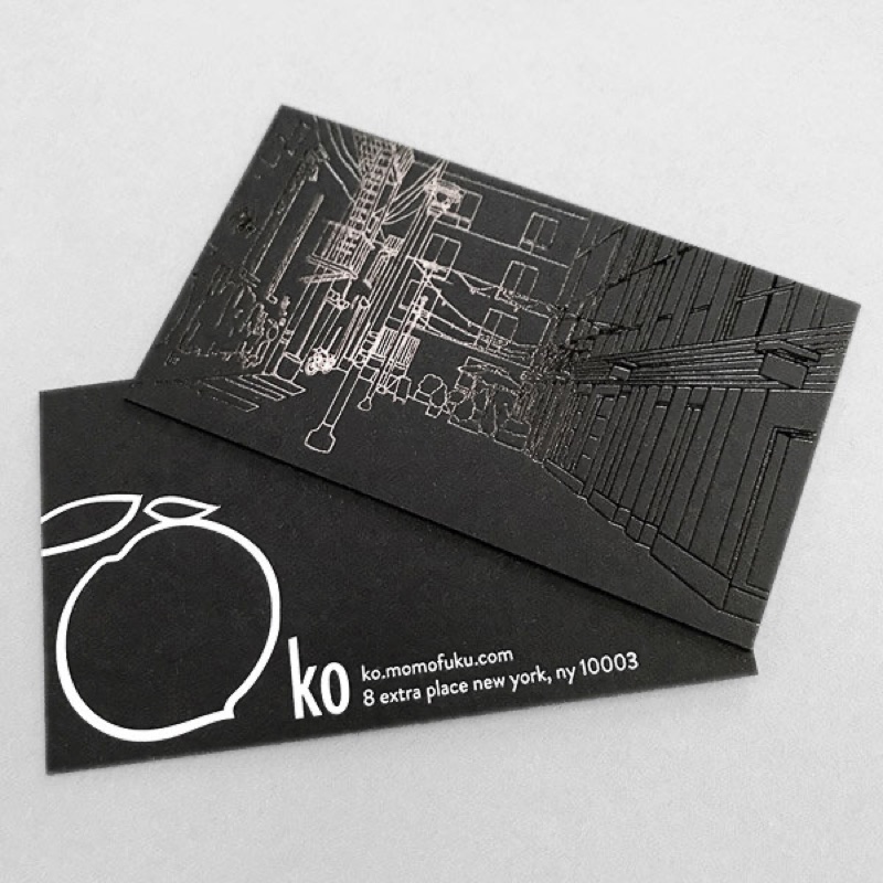 Black foil stamped business card for Momofuku