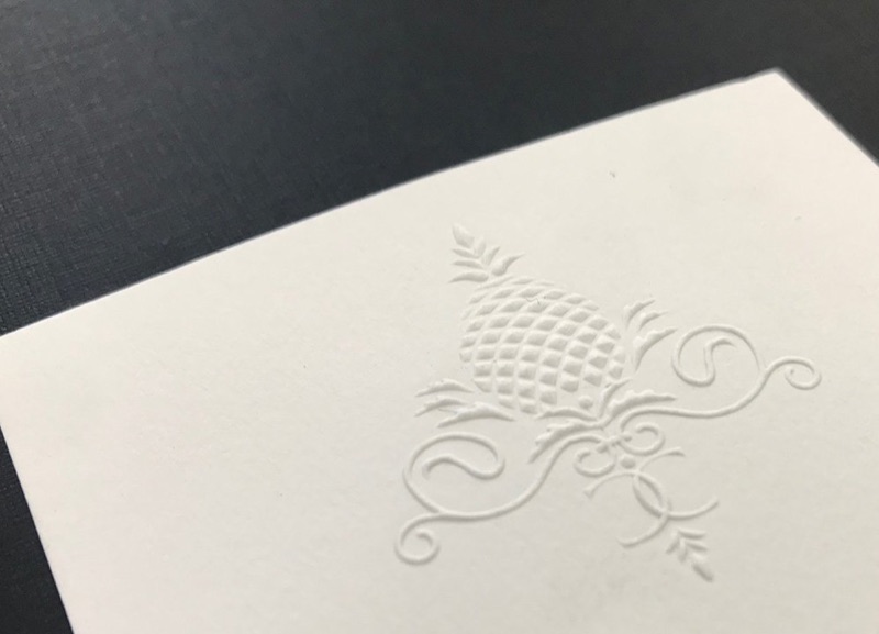 Blind engraved white ink stationery
