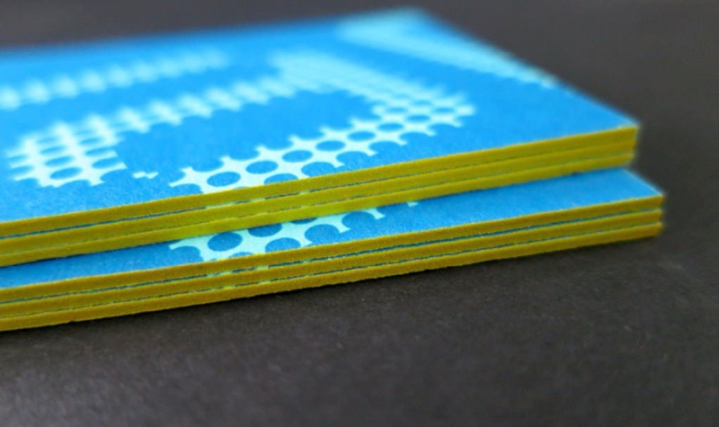 Blue pixel-pattern cards with yellow painted edges