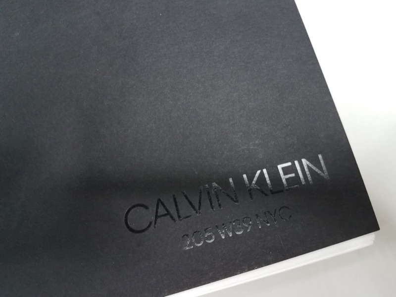 Blind deboss black book cover for Calvin Klein