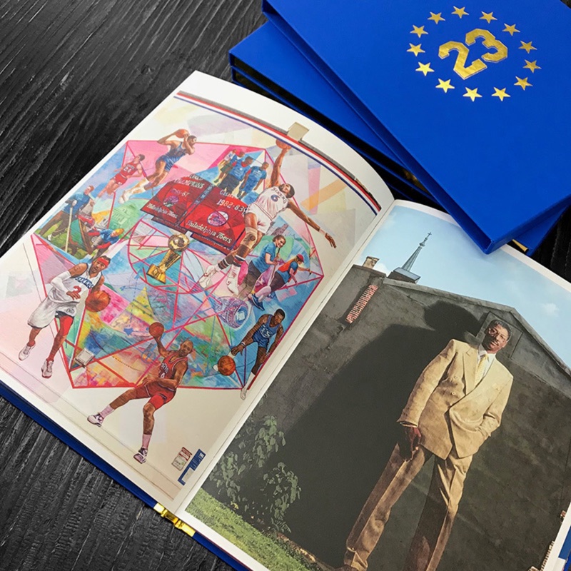 Casebound photo books open to full-color spreads