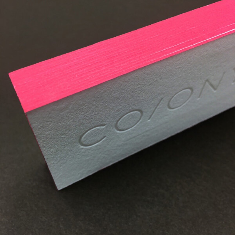 Deboss letterpress business card with fluorescent pink edge