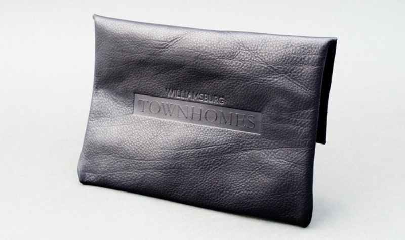 Leather pouch with debossed logo stamp