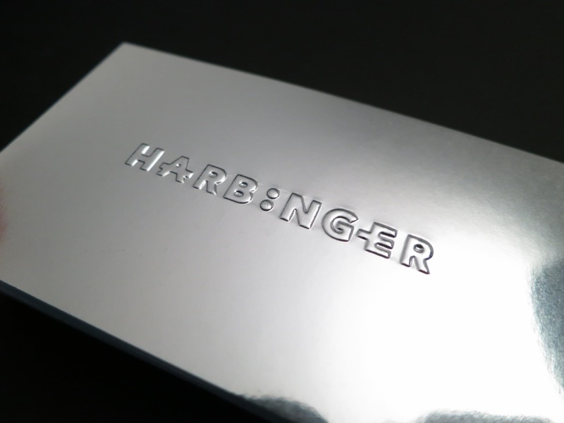 Embossed silver mirror business card