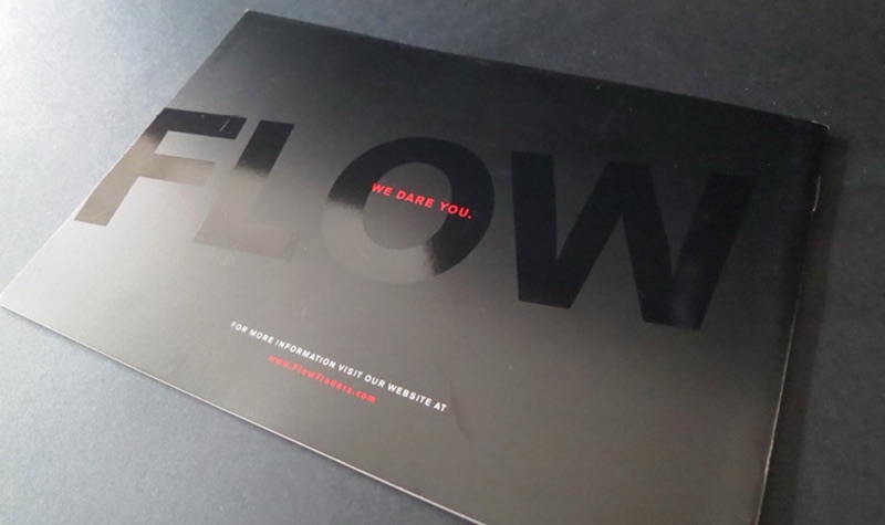 FLOW brochure with spot UV gloss type on black