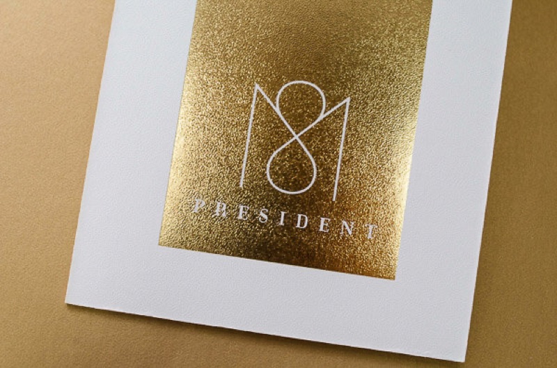 Gold foil panel with monogram on stippled letterpress card