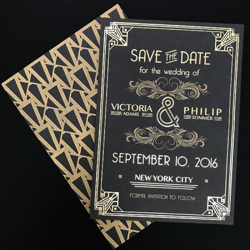 Gold ink wedding invitation printed on black paper