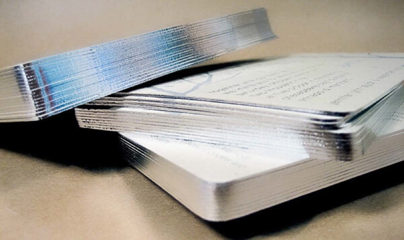 Invitation stack with silver gilded edges