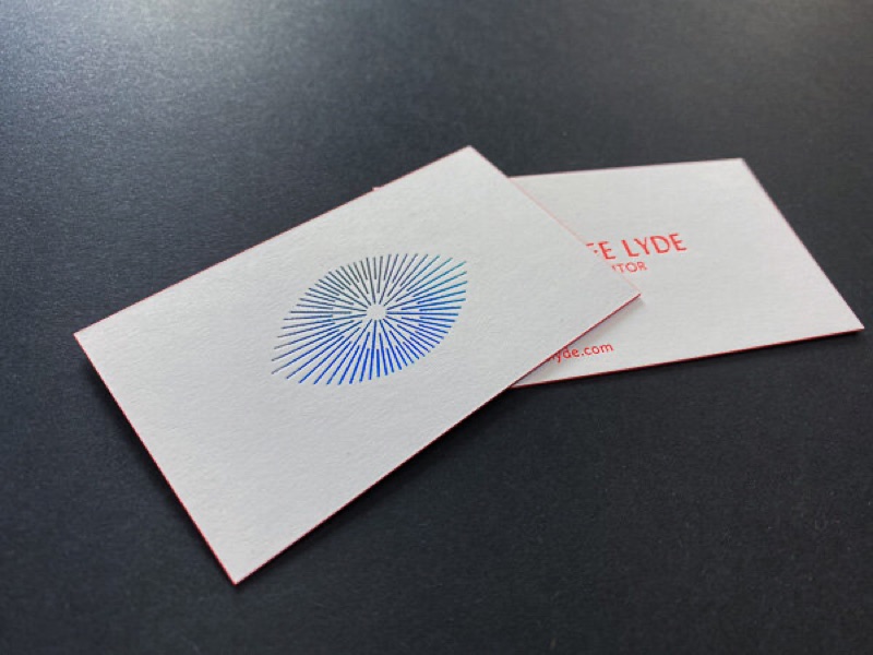 Iridescent foil logo with fluorescent ink business card