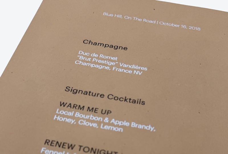 Signature cocktail menu printed white on kraft