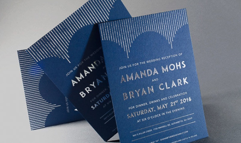 Navy wedding invitations with silver foil pattern and lined envelope