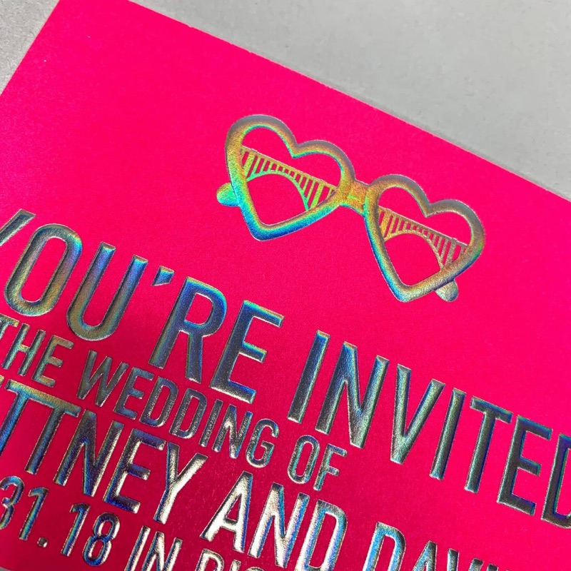 Neon pink wedding invitation with holographic foil type
