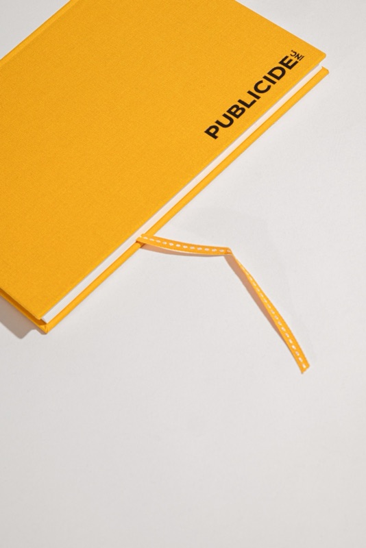 Publicide yellow cloth notebook with ribbon marker