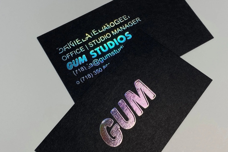 Rainbow hologram foil on black business cards