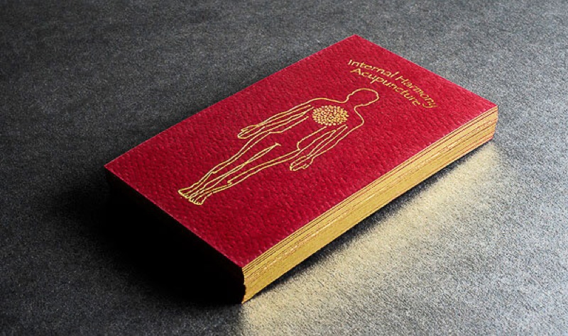 Red letterpress card with gold gilded edge