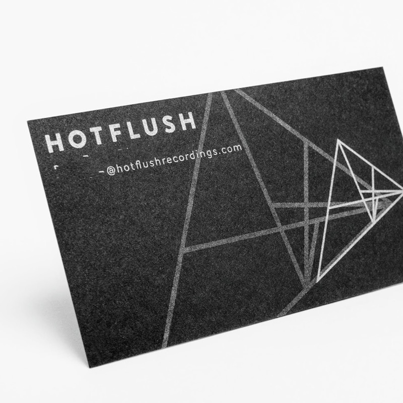 Silver ink on black paper business card