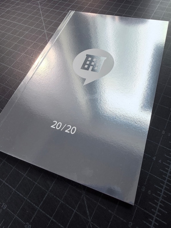 White ink printed on silver mirror paper book cover