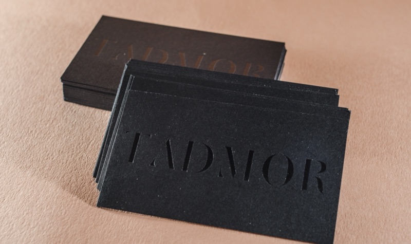 Tadmor black cards with tonal clear foil wordmark