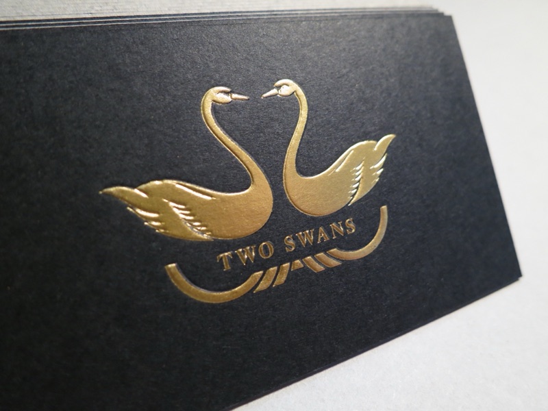 Two Swans gold foil on black card