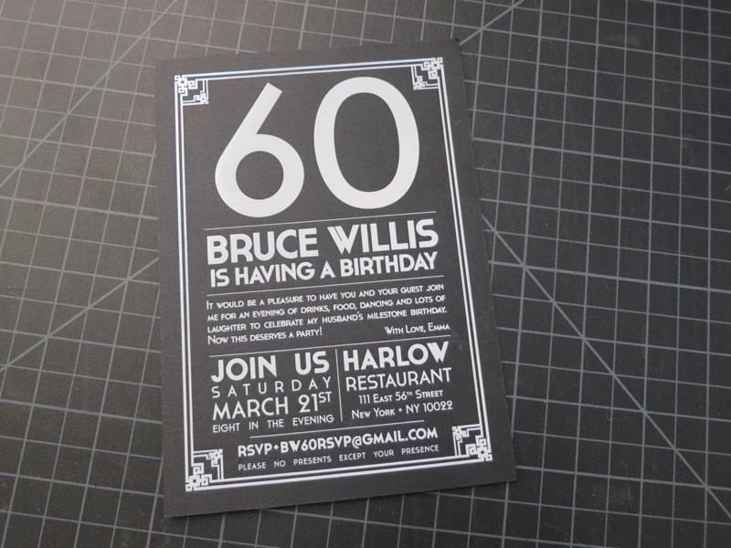 White ink birthday party invitation on black paper for Bruce Willis