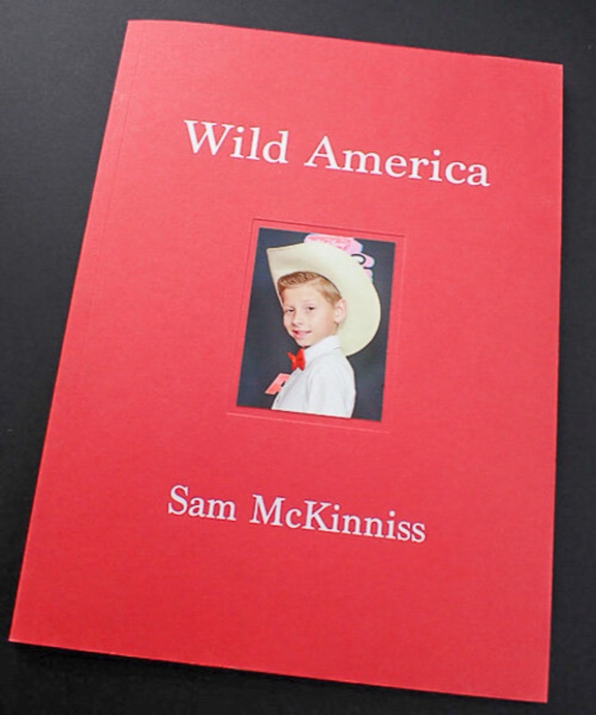 Wild America artist book with die-cut window cover