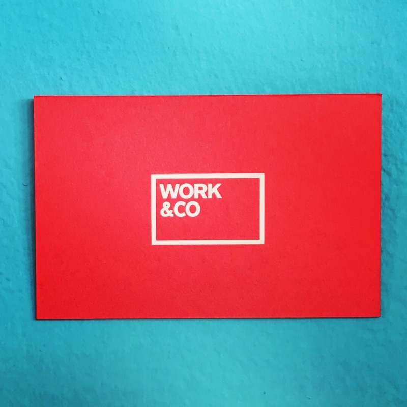 Work & Co white foil on red card